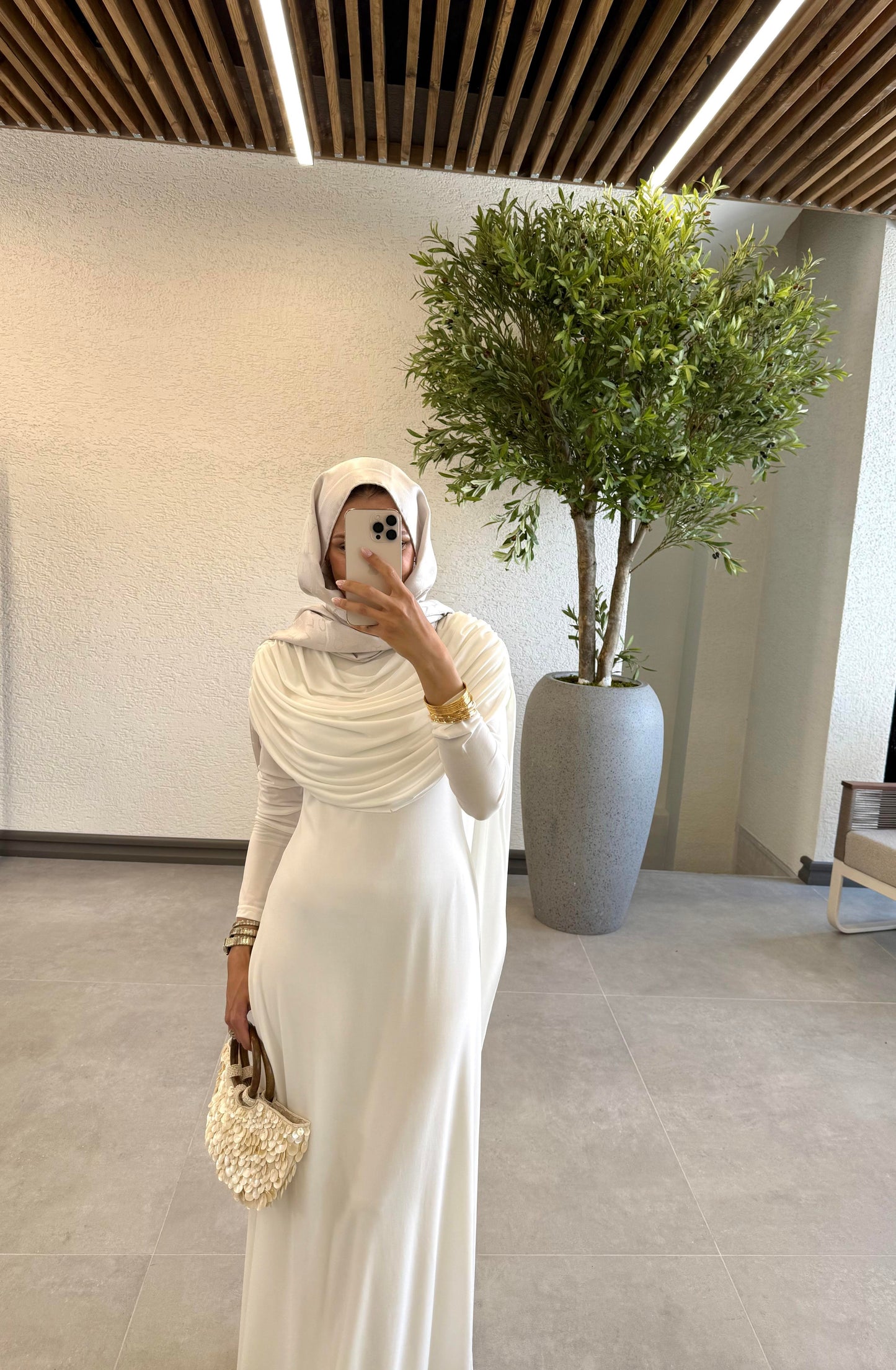 Off-White Evening Gown with Shawl Collar and Cape Detail