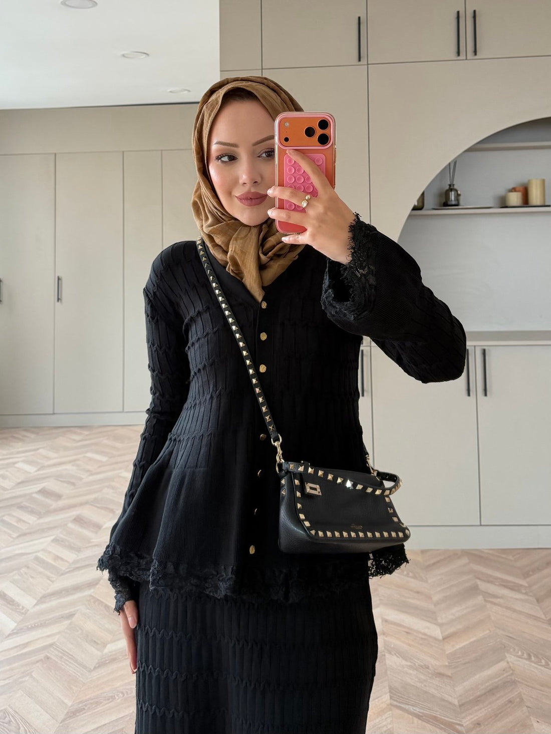 Viona Lace-Trim Knit Cardigan and Maxi Skirt Set in Black: pose