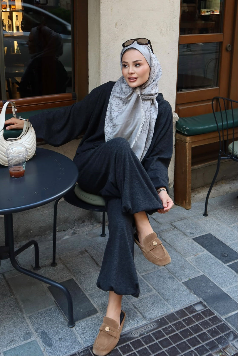 Charcoal relaxed harem pants and long sleeve co ord set seated