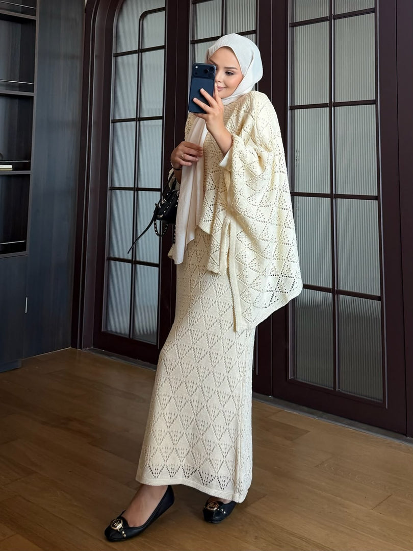 Cream openwork knit poncho and maxi skirt three piece set – side