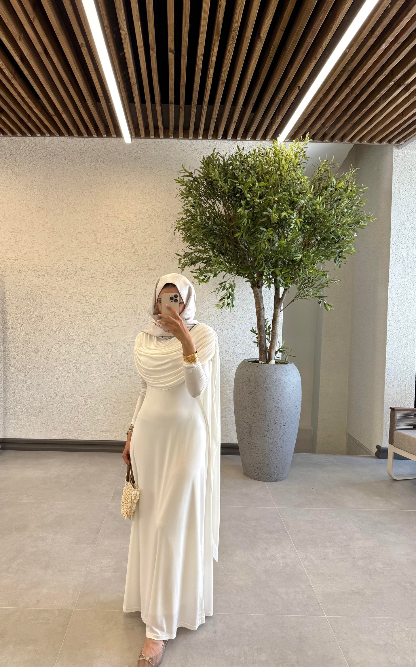 Off-White Evening Gown with Shawl Collar and Cape Detail