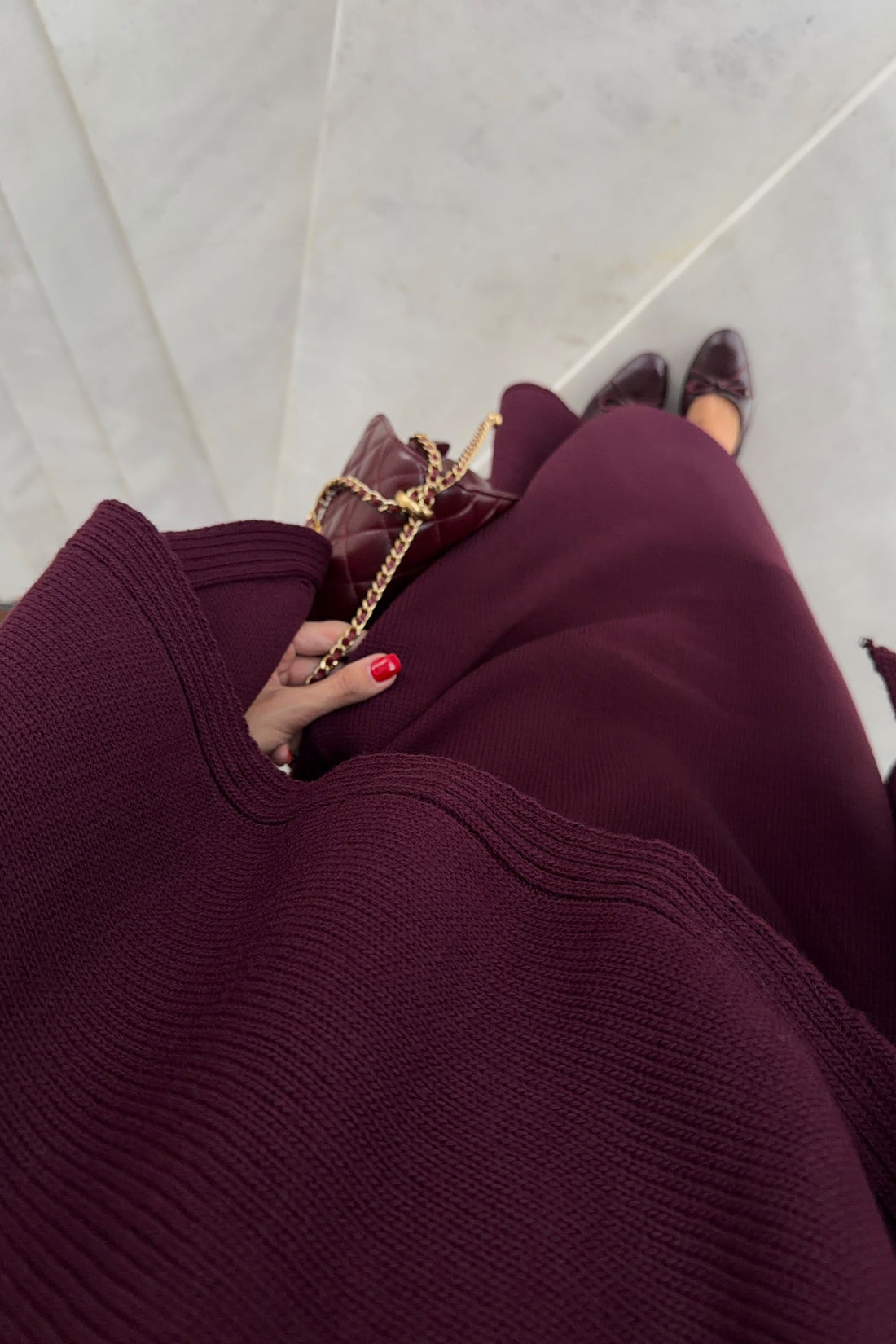 Plum fine knit texture close-up