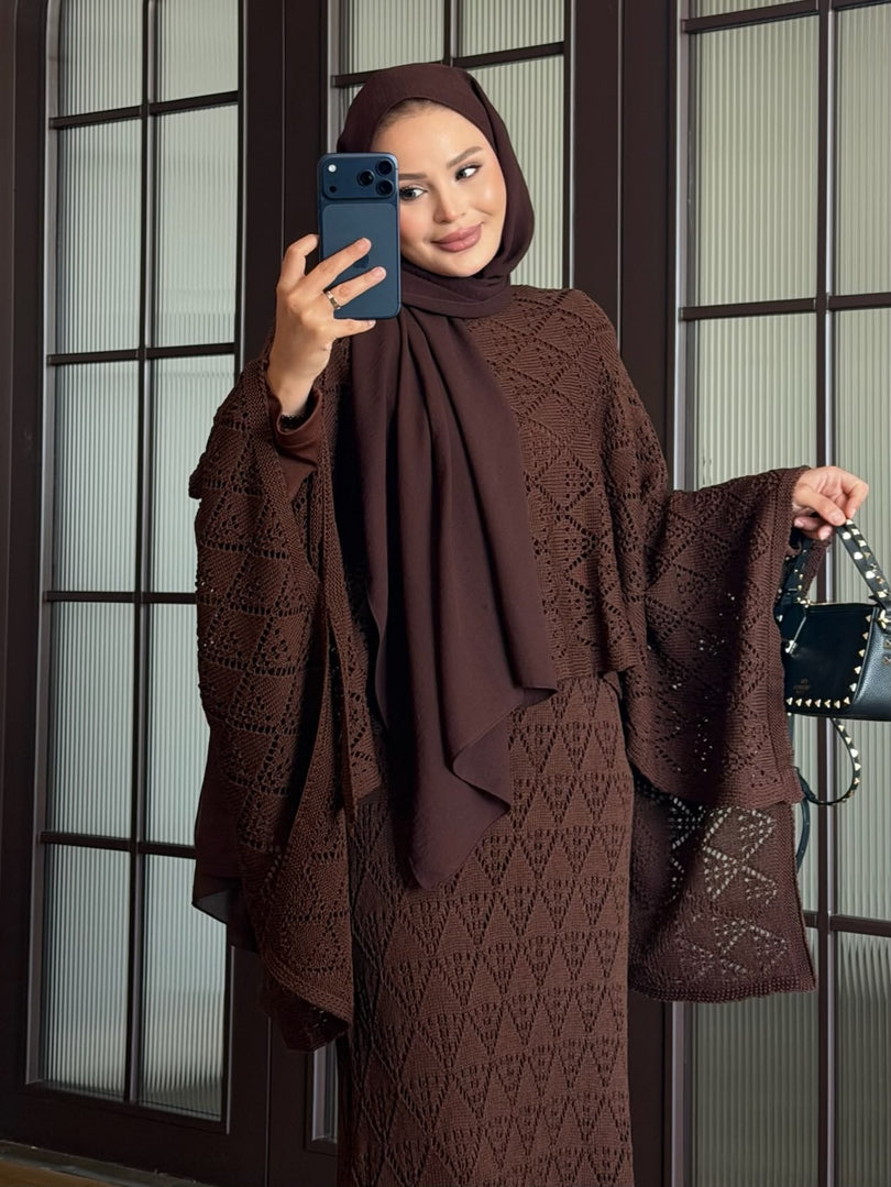 Brown openwork knit poncho and maxi skirt three piece set – close