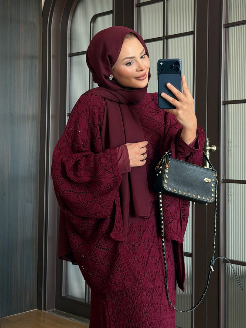 Burgundy openwork knit poncho and maxi skirt three piece set – detail